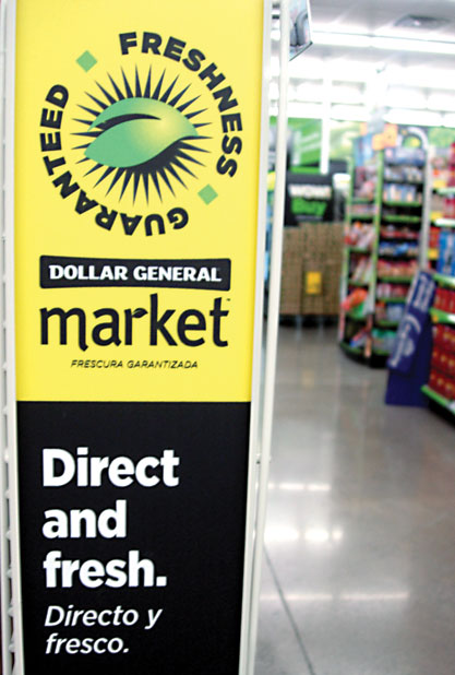 Dollar General (pictured here and above) and rival Family Dollar have revamped their stores to compete more directly with supermarkets.