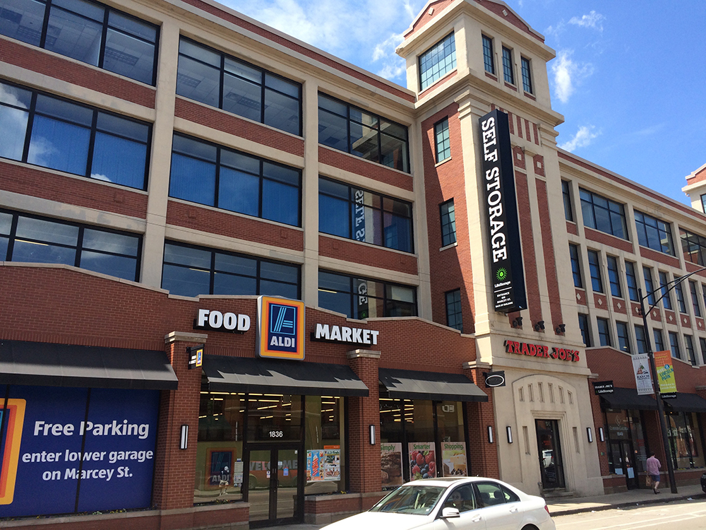 A Trader Joes and an Aldi store are co-located in the same Chicago building