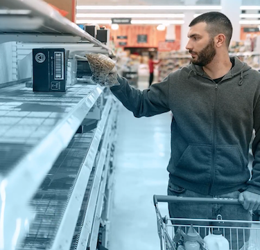 Grocery shopper-COVID empty shelves-FMI Midwinter-Sarasin keynote.png