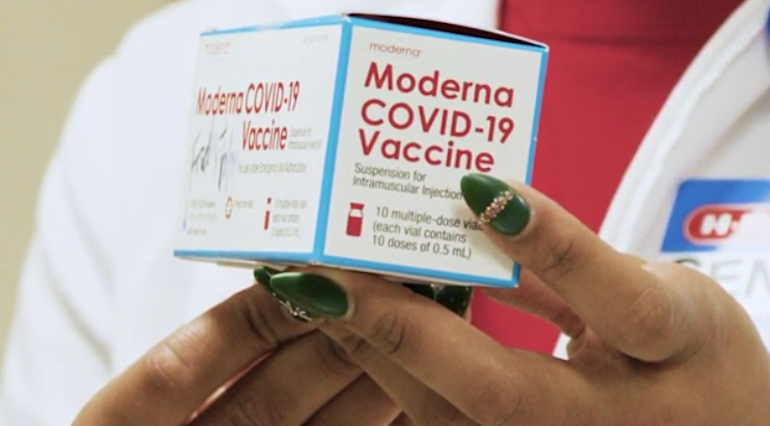 HEB pharmacist-Moderna COVID vaccine.png