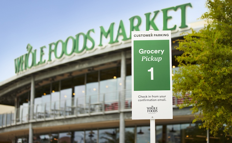 Whole Foods curbside pickup sign.jpg