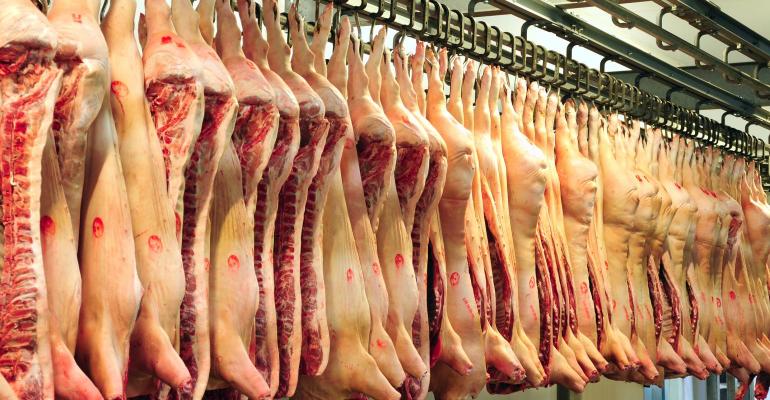 Pork carcasses hanging in cooler_marina_karkalicheva_iStock_Thinkstock-157116556_0.jpg