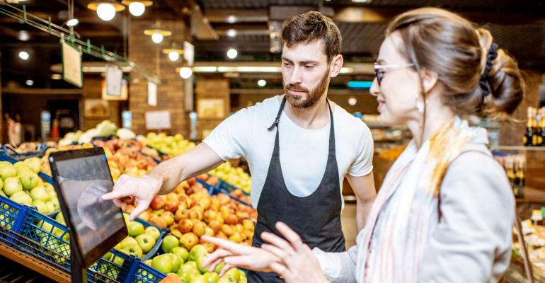 Young supermarket worker-GettyImages-1139293064.jpg