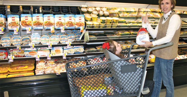 Drew Ann Long takes her daughter shopping in Caroline39s Cart designed for specialneeds children