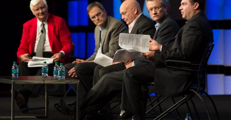 Thom Blischok of Booz amp Co far left led a panel discussing FMI39s Trends report that featured left to right Joe Crafton of Crossmark Todd Hale of Nielsen Nick Hodson of Booz amp Co and John Miles of Catalina Photo by Greg CohenProView Events