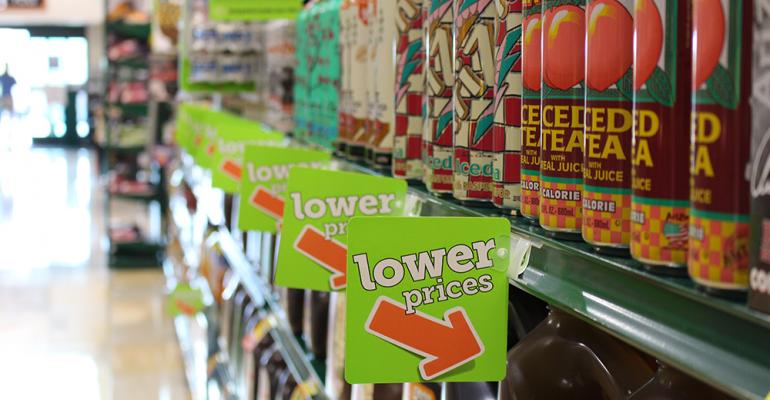 Green shelf tags call attention to items that have lower prices