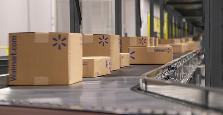This shipping department conveyor belt stays busy at the Walmart ecommerce fulfillment center