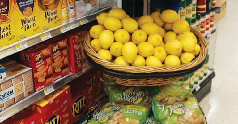 Merchandising produce away from the crowd