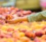 Supermarket consumer shops for peaches
