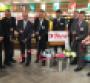 Tops executives and local community leaders cut the ribbon to open the new store