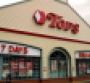 Tops cuts losses in 2Q; deflation dings comps