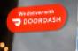 DoorDash delivery-retailer window sign.jpg