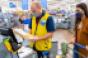 Walmart checkout-associate helps customer.jpg