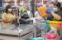 Walmart_shopper_at_checkout-COVID_copy.png