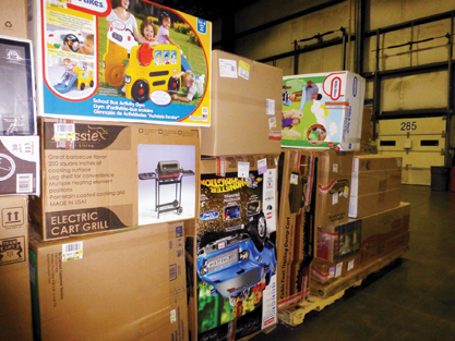 Items at a Bentonville, Ark., distribution center await delivery through Wal-Mart’s “site to store” Internet shopping option.