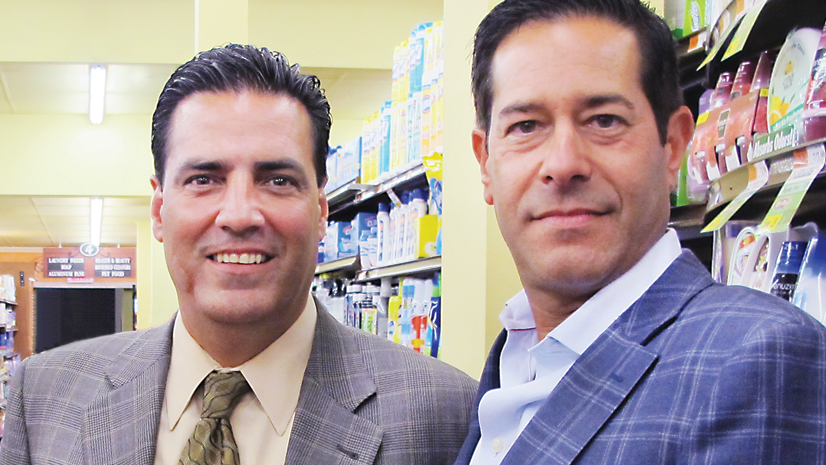 Gino Palummo, vice president of development for Key Food, with Coney Island store owner Jeffrey Linsenbaum. 