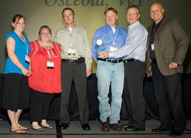 From left: Susan Hubred, Rhonda Kobernick, Aaron Thoms, Tim Adams and Doug Rinehart, Dick's Fresh Market, Osceola, Wis.; Scott Morris, Supervalu.