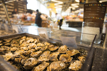 Customers can enjoy fresh oysters and wine at Mariano’s in-store oyster bar in Chicago.  