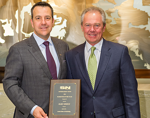2014 Marketer of the Year Marc Giroux of Metro (left) and SN publisher Jerry Rymont at FMI Midwinter Tuesday.