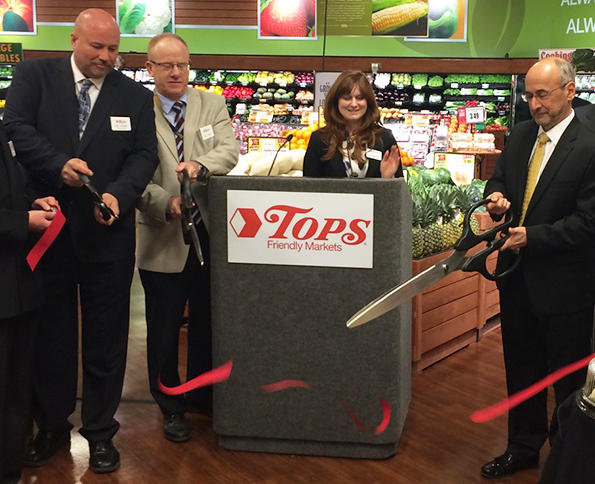 From left: Pat Golden, Tops South Park Avenue store manager; Eric Wurl, Tops district manager; Katie McKenna, Tops communications/PR manager; and Frank Curci, Tops chairman, president and CEO.
